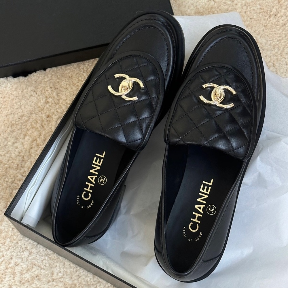CHANEL Black Quilted Leather Loafers with Gold CC Medallion